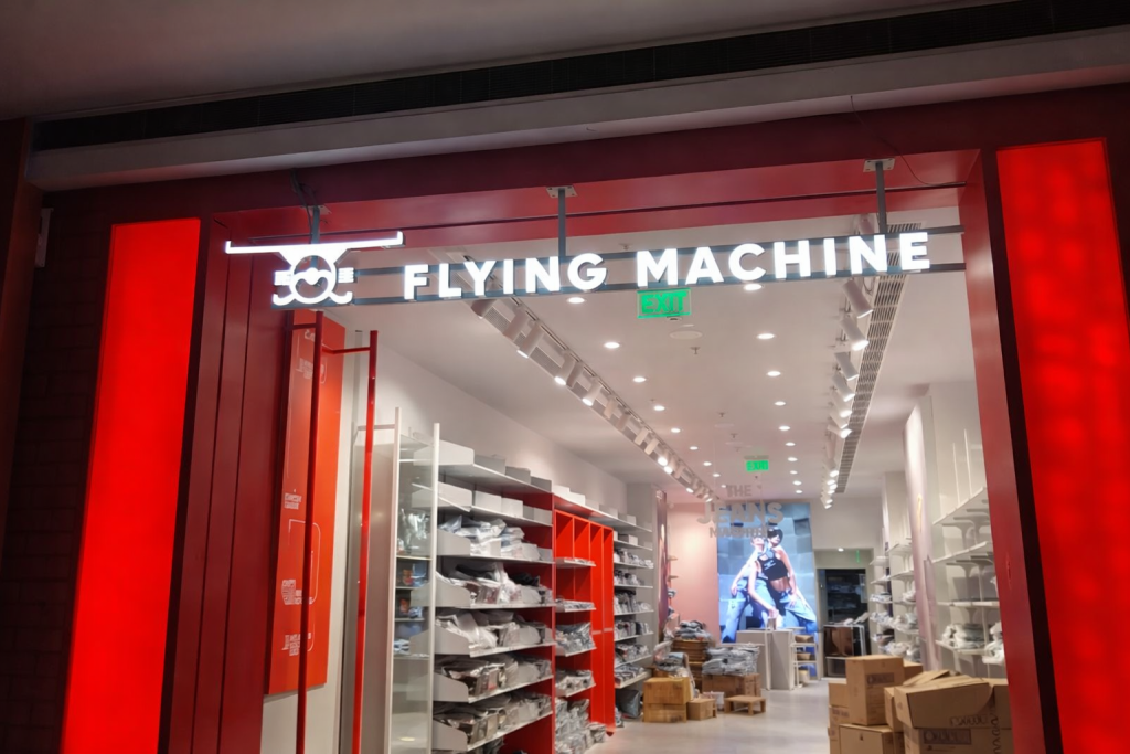 Flying Machine signage installation project completed by Signsutra